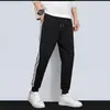 Chaqueta deportiva casual 2024 para hombre y mujer, suéter con cuello alto de tres rayas, chaqueta de pareja de alta calidad para primavera y otoño