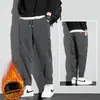 Pantalones de hombre marca de moda ins todo-partido pantalones deportivos primavera, otoño e invierno holgados con tobillo fruncido forro polar cálido casual pants de chándal