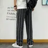 Pantalones casuales rectos a rayas de estilo coreano chic para primavera y otoño para hombre, estilo Harajuku, holgados, de pierna ancha, largos, para hombre y mujer.