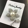 Versión coreana de broche de tulipán de perla de diamante de alta gama, alfiler de moda para mujer, corsage, broche de flor, venta al por mayor, personalizado