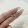 Uñas de Hueso de Oreja Diamante Blanco Planeta Tierra Brillantes Exquisitas Otoño e Invierno Diseño de Nicho Ins Dulce Fresco Chica Picante Aretes de Caracol para la Oreja