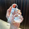 Chaveiro de panda cheio de óleo, garrafinha com areia movediça de maçã, pingente de bolsa, chaveiro de carro, prêmio de máquina de pegar, pequeno presente