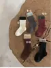Suministradas directamente de fábrica, calcetines infantiles lisos de algodón peinado con bloques de color de otoño WK878, calcetines infantiles retro sin costuras estilo coreano