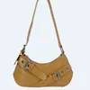 Bolsa Feminina Estilo Motociclista Retrô com Rebites 2026 Nova Grande Capacidade Ombro Único Sob o Braço Moda Hot Girl Bolsa para o Dia a Dia