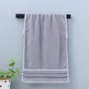 Toalha de algodão puro Gaoyang, fabricante atacadista, absorvente, para supermercados, toalha facial especial, algodão grosso, para uso doméstico, adulto, sem fiapos.