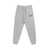 Comercio exterior transfronterizo Gallery dept graffiti de tinta salpicada pantalones casuales camuflaje costuras leggings de pareja pantalones pantalones moda