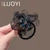 2025 Nuevo Estilo Coreano Lujo Ligero Diamante Brillante Flor de Cuatro Hojas Malla para el Cabello para Mujeres, Accesorio para el Cabello Simple de Moda y Versátil