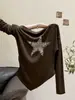 Colección Otoño 2026: Camiseta de manga larga sencilla, elegante y genial con estampado de estrella de cinco puntas, diseñada para mujeres. A14365