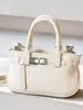 Moda Primavera 2026 Versátil Bolsa de Mão Elegante e Moderna Bolsa de Ombro Transversal com um Toque Vintage de Alto Padrão