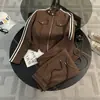 Conjunto Casual Esportivo Elegante e Jovem da Moda Europeia para Mulheres, Novo Conjunto de Duas Peças Tendência para Primavera e Outono: Blusa Cardigan e Calça de Cintura Alta Wide Leg