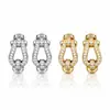 Moda de lujo ligero, totalmente incrustados de diamantes, versátiles, simples, ear cuff de herradura para mujer, sensación de alta gama, pendientes de botón con hebilla de herradura, pendientes de diseño nicho