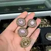 Botones metálicos de moda retro de alta gama con incrustaciones de diamantes y piedras preciosas para abrigos, pieles, visón, cheongsams, cárdigans y suéteres