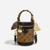 Bolso Bandolera Redondo Cilíndrico con Monograma Monica Kiki para Mujer 2026 Nuevo Bolso Cubo de Hombro Único Bolso Versátil de Lujo Ligero para Mujer