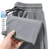 Fabricante Direto Calças Esportivas de Seda Gelada de Verão para Homens, Calças Jogger Finas Modernas Largas e Caídas, Calças de Marca Versáteis e Modernas