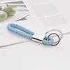 Chaveiro de corda de couro trançado com anel duplo para homens e mulheres anel de chaveiro de carro pingente de bolsa de boneca atacado