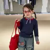 Camiseta básica para niña para primavera y otoño 2026, nuevo modelo, camiseta de manga larga para niños, ropa interior de otoño estilo coreano para bebé, top de cuello redondo