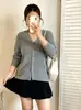 Top versátil de manga larga holgado para mujer talla grande, un cárdigan de punto casual para otoño de 2026, perfecto para mujeres con un poco de sobrepeso.