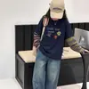 Sudadera de niña transfronteriza, atuendo de otoño, base de camiseta de dos piezas simuladas, nuevo modelo 2026 de camiseta de algodón puro para niños, top de primavera y otoño para niños mayores