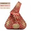 Venta al por mayor del fabricante Empaques de regalo grandes y pequeños Bolsas de regalo de almacenamiento Bolsas de mano con asa única estilo chino para recuerdos