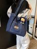 Bolso de hombro de lona vaquera para mujer, bolso de compras de gran capacidad, bolso de mano artístico de nicho, bolso informal japonés y coreano combinable con todo.