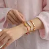 Wanxing Amazon Transfronterizo Corazón Rojo Goteando Aceite Pulsera Abierta de Acero Inoxidable Simple Elegante Joyería de Alta Gama para Mujeres