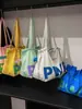 Bolsa de Ombro Feminina de Verão 2025 Casual de Grande Capacidade Bolsa Tote Casual de Lona de Nylon Bolsa para Estudante