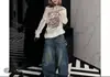Blusa de manga larga estilo retro americano de verano, estilo urbano, gris, fina, con aire acondicionado, diseño superior, suéter de punto calado para mujer