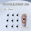 Serie blanca accesorios de aleación con letras cruzadas para decoración de uñas venta caliente transfronteriza pintura en aerosol decoración de uña de dedo portátil