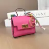Mini cartera, charm de bolso de lujo, mini bolso de platino, llavero de coche lindo y creativo, bolsa para lápiz labial y audífonos