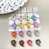 Serie de Caricaturas Lindas de Acrílico Cuentas con Agujero Recto de Fantasma Pintado Cadena para Teléfono Móvil Colgante Accesorios de Joyería