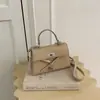 Bolso de mujer de moda 2026 verano nuevo de alto valor bolso tipo Kelly bolso de mano de moda patrón de cocodrilo bolso de hombro cruzado