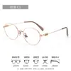 Gafas de titanio puro plateado de alta tecnología, montura ovalada ultraligera de 8 g para mujeres con miopía 125216F, montura sin borde para rostros cuadrados y redondos