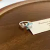 Anel de Dedo Estilo Resort à Beira-Mar com Zircônia, Gota de Óleo e Pérola Estrela Doce Fashionável Nicho Alto Padrão Exquisite Joia de Mão