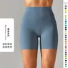 Pantalones de yoga de estilo nuevo sin línea de vergüenza color piel para mujer, cintura alta, realce de glúteos, compresión abdominal, shorts deportivos de tres puntos