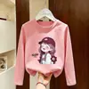 Roupas Casuais Estilosas para Crianças Primavera e Outono 2026 Moda Feminina Camiseta de Manga Longa Menininhas Algodão Puro Desenho Animado Camisa Básica de Outono