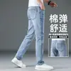 Jeans Finos de Alta Gama Xintang para Hombre 2026 Nuevo Corte Recto Delgado Estilo Casual Elásticos Azul Claro