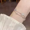 Pulseira de Flor de Trevo de Quatro Folhas com Design de Luxo Leve Fresco e Estiloso, Joia Versátil de Alto Padrão para Uso Diário