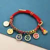 Pulseira Flor de Pessegueiro dos Cinco Deuses da Riqueza Estilo Xizang, Cordão de Nó Flor de Pessegueiro Tecido à Mão, Pulseira Thangka de Corda Multicolorida Estilo Étnico