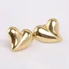 Pendientes de botón de moda transfronteriza europea y americana, nuevos, 17 mm, simples, bicolor, medio corazón, acero inoxidable, pendientes de oro de 18 quilates, venta al por mayor