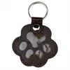 Colgante Creativo de Cuero con Forma de Pata Hebilla Conmemorativa para Mascotas Almacenamiento de Pelo de Gato y Perro Adorno de Foto de Mascota Colgante Lindo de PU