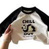Camiseta de Manga Larga 100% Algodón para Niños 2026 Nueva Prenda Base Raglán para Niños Pequeños y Niños Pequeños Elegante Camiseta de Bloques de Color de Dibujos Animados