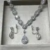 Yiwu accesorios de novia nicho elegante cadena de garra de circonita y diamantes de imitación collar pendientes para niñas traje de joyería venta al por mayor