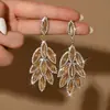 Pendientes de Pluma de Pájaro de Lujo Transfronterizos Borla Cristal Pluma Pendientes de Mujer Pendientes Combinación Vestido Pendientes de Banquete Venta al por Mayor