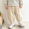Pantalones casuales para niños, nuevos estilos de primavera y otoño, ropa infantil estilo coreano, cintura elástica, pantalones largos, color liso, corte holgado