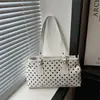Bolsa tote, bolso de hombro único de nicho con una textura elegante, bolso de axila versátil y moderno, nuevo modelo 2026, bolso de mano de gran capacidad, bolso de lunares para mujer