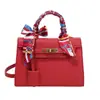 Bolso de mano moderno y elegante para mujer 2026 nueva textura retro alto valor estético simple textura de uso diario bolso cruzado pequeño cuadrado