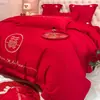Set de cuatro piezas de algodón puro bordado de estilo chino de alta gama de sábanas y fundas nórdicas de algodón puro rojo brillante para ajuar ropa de cama de boda
