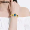 Reloj Femenino Popular Transfronterizo Moka, Esfera de Nácar de Lujo Ligero, Reloj de Cuarzo Compacto, Reloj de Pulsera Redondo Simple Impermeable para Mujer