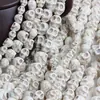 Cráneo de piña de cabeza transfronteriza cráneo cuentas de cráneo piedra de pino blanco cabeza de fantasma cuentas sueltas Accesorios de joyería étnica DIY