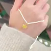 Colar com Pingente de Floco de Neve Pequeno Dourado Feminino Outono e Inverno Novo Colar de Luxo Acessível Design de Natal Corrente de Clavícula de Alta Qualidade
